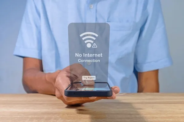 Man Using Smartphone No Internet 600nw 2477215953